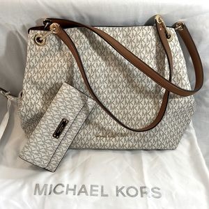 Very large, multiple compartment MK Shoulder bag with matching wallet.